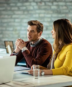 httpselements.envato.comsmiling-couple-communicating-with-their-insurance--Q2VEF73